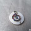 Broche aimantée "Clé de sol strass sur nacre"