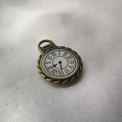 Broche aimantée "Petite horloge striée bronze"