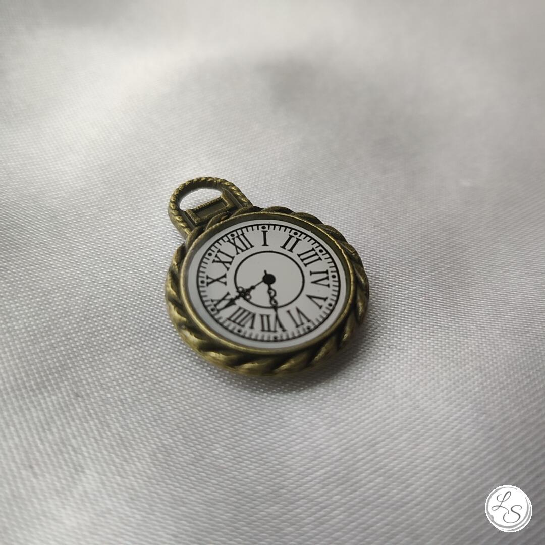 Broche aimantée "Petite horloge striée bronze"